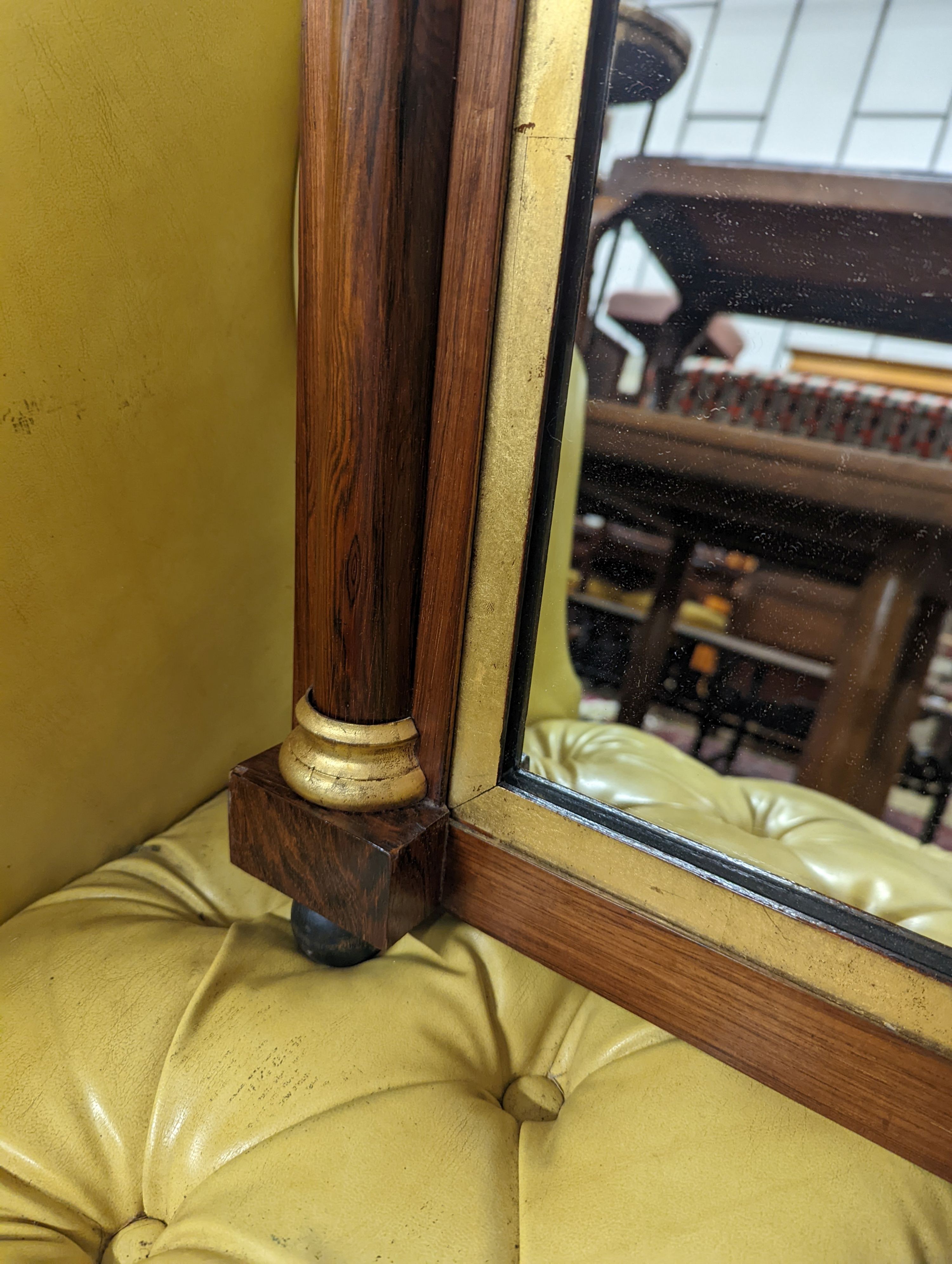 A Victorian rosewood parcel gilt overmantel mirror, width 91cm, height 59cm